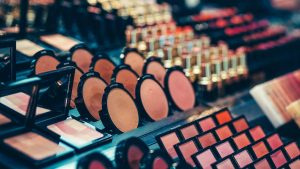 Why is London a hub for leading cosmetics companies