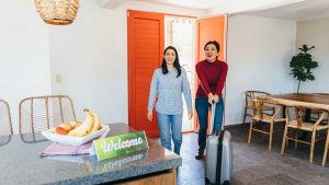 Who can benefit most from using a vacation home rental company in London